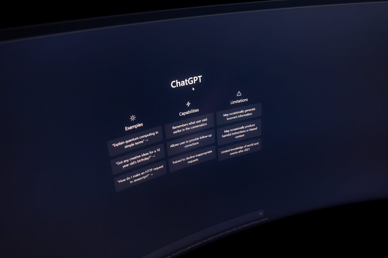 why-choose-us Close-up of a computer screen displaying ChatGPT interface in a dark setting.